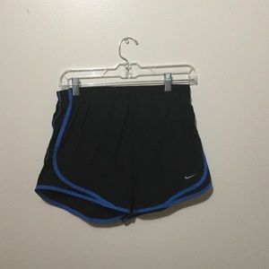 A dry fit Nike blue and black short